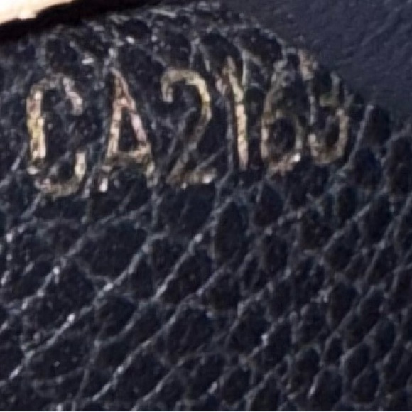 Authentic the Monogram Empreinte Leather wallet - like new - Picture 6 of 7